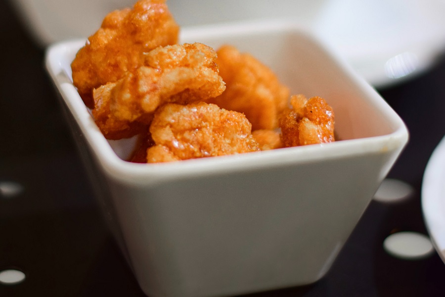 Easy Recipes for Orange Chicken Close Up of a Small Bowl Filled with Orange Chicken Pieces