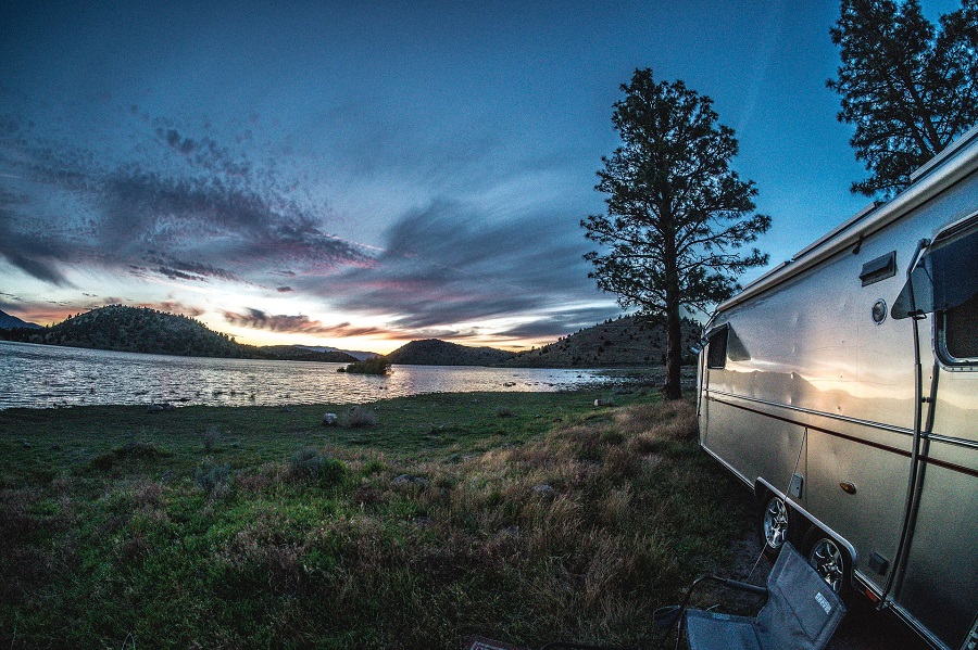 Crockpot Recipes for Camping RV Parked on the Shore of a Lake at Night
