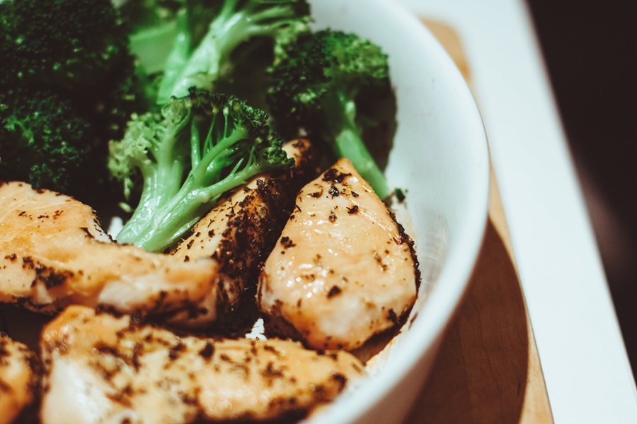 Best Instant Pot Chicken and Rice Recipes Close Up of a Bowl of Chicken and Rice with Broccoli